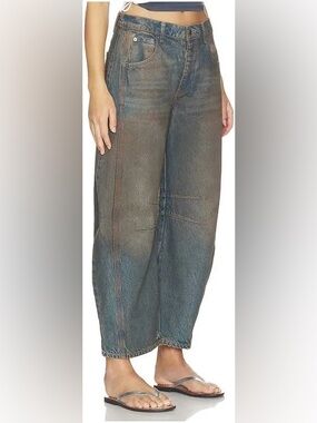 We The Free Lucky You Mid Rise Barrel Denim Distressed Jeans.